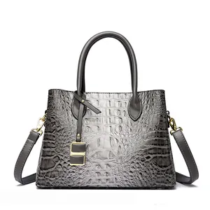 Elegante borsa a mano da donna grigia con motivo a coccodrillo e tracolla rimovibile