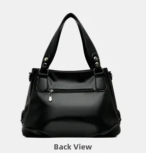 Back view of black lychee texture tote bag featuring a horizontal zipper pocket