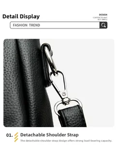 Detail of detachable shoulder strap with silver metal swivel hook on black tote bag