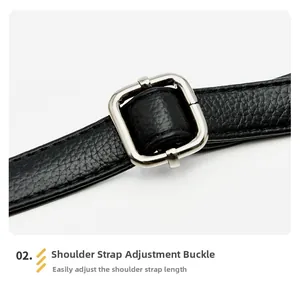 Detail of adjustable black litchi texture leather strap with silver metal buckle