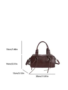 Detailed dimensions of a brown leather boston bag with silver rivets and woven handles