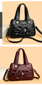 Detailed view of luxury leather handbags with pleated bows, rhinestones and gold hardware