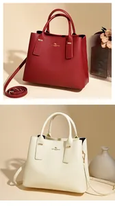 Close-up of premium lychee texture leather bucket bags in burgundy and beige colors