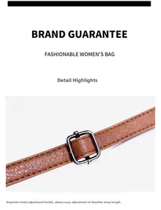 Detail of adjustable brown leather strap with silver buckle for shoulder bag