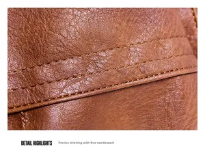 Detailed macro view showing the precision stitching on the brown vintage leather handbag