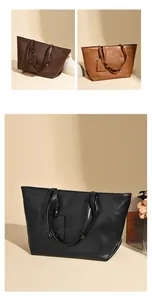 Close-up of soft leather tote bags in black, dark coffee and brown with kangaroo logo
