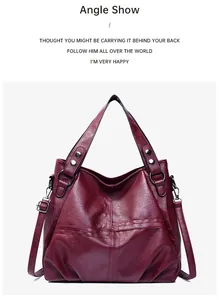 Close-up of vintage burgundy faux leather texture and metallic rivet detail on handbag