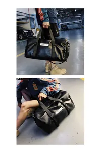 Vue détaillée du grand sac de sport en cuir PU noir avec compartiment à chaussures et anses