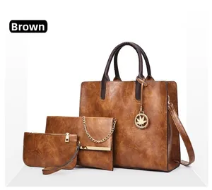 Ensemble de sacs 3 pièces en similicuir orange avec grand cabas et pochette à bandoulière