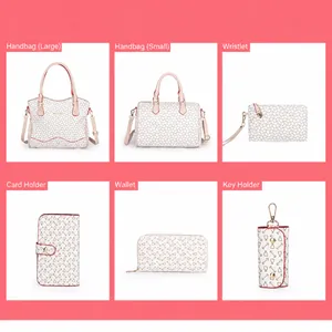 Vista detallada del set de 6 bolsos blancos con corazones rojos y asas rosas