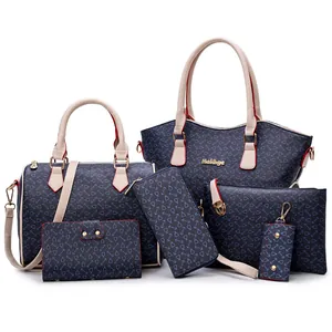 Conjunto de 6 bolsos azul oscuro con estampado de anclas y asas blanco crema