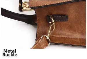 Détail du fermoir en métal doré de haute qualité sur sac à main en cuir marron
