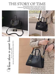 Détails de ce sac fourre-tout en cuir grainé noir avec finitions dorées et logo kangourou