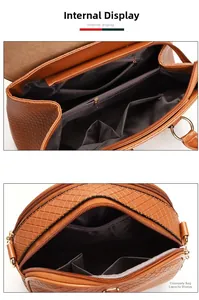 Macro view of brown woven handbag interior featuring functional zip compartments and lining