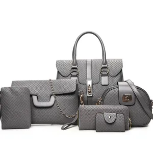 Grey 6-piece women's handbag set featuring tote, crossbody and wallet with gold hardware