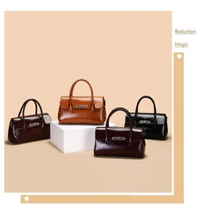 Detailed view of four glossy leather handbags with woven handles and silver metal locks