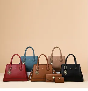 Detailed display of tote bags in multiple colors featuring textured leather and golden charms