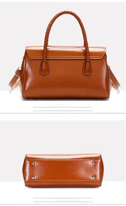 Detailed view of caramel brown handbag bottom with silver metal feet and woven handle