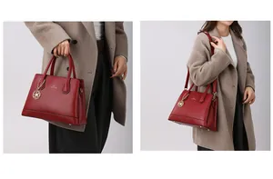 Close-up of wine red leather tote bag with metal chain flower charm and dual handles