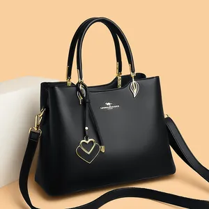 Classic black leather handbag with litchi texture and golden kangaroo hardware detail