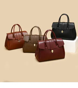 Detailed view of vintage textured tote bags in caramel, brown, red, and black leather