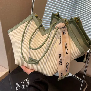 Beige and green pleated canvas tote bag with fashion straps for daily commute use