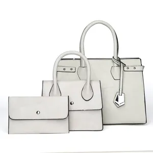 Three-piece beige patchwork tote bag set with silver hardware and black edge paint