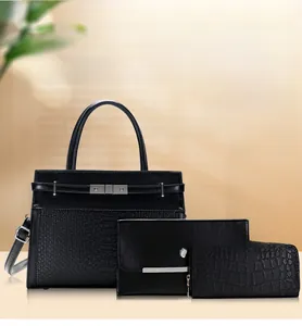 Three-piece black set featuring embossed crocodile texture handbag and matching wallets