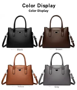 Nuancier de grands sacs à main de luxe en noir, marron, jaune et gris avec détail métal