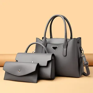 Ensemble 3 pièces de sacs à main en cuir gris texturé avec plaque triangle en métal