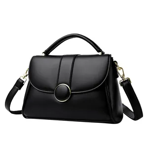 Elegant black lychee grain leather tote bag with gold hardware and top handle for women