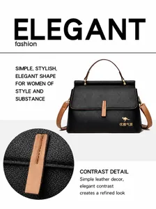Dettaglio macro di cuciture e trama su una borsa a contrasto nera e marrone