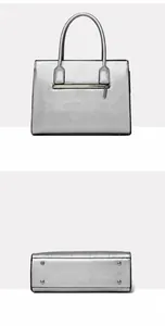 Silver tote bag detail showing back zipper pocket and metal feet on the bottom