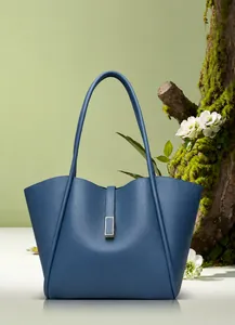 Detailed view of Morandi blue tote bag with litchi texture and gold metal buckle