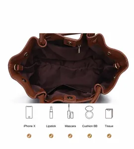 Macro shot of large capacity dark brown leather tote bag interior with multiple compartments