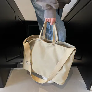 Bolso tote de lona beige con correa ajustable para el uso diario y el transporte