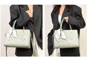 Détail de la broderie papillon et texture d'un sac à main élégant vert clair