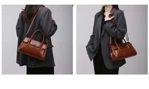 Détail du sac cabas en similicuir marron avec fermoir rotatif et poignée tressée