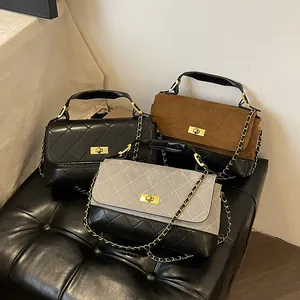 Quilted crossbody bags set with chain straps in black and brown matte leather
