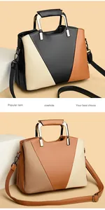 Close-up of contrast color tote bag made of high-quality cowhide with lychee grain texture