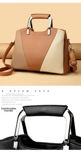 Detail of three-color patchwork tote bag featuring pebble grain texture and metal handle