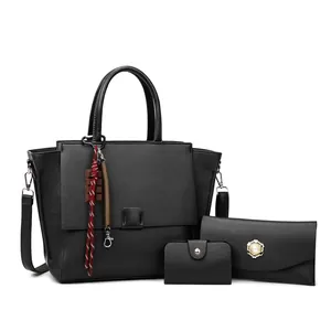 3-delige zwarte lederen tote bag set met schoudertas en parelmoer bloemen clutch
