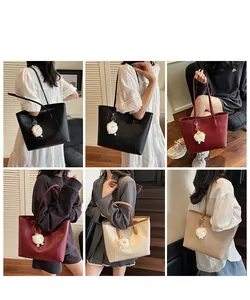 Detailed views of high-capacity tote bags in black, burgundy and beige with plush charms