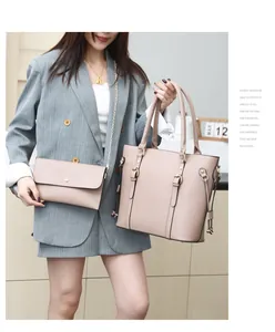 Lifestyle shot of nude pink tote bag set with golden chain strap and soft matte finish