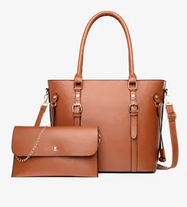 Detailed view of the brown 2-piece set including a tote bag and a small chain pouch
