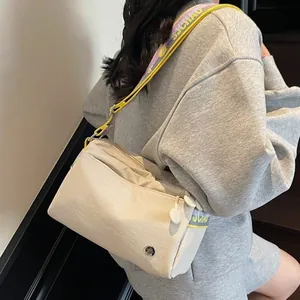 Large capacity beige nylon crossbody bag with chic lettered wide strap for women