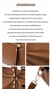Detailed close-up of brown lychee grain leather bag with premium gold-tone metal hardware