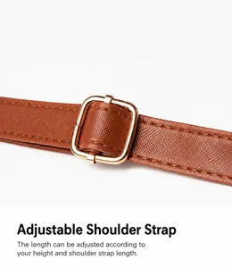 Macro shot of adjustable brown crossgrain leather strap with a gold metal buckle