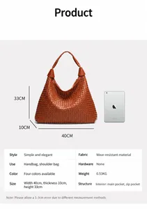 Brown woven hobo bag size comparison with tablet showing detailed texture and dimensions
