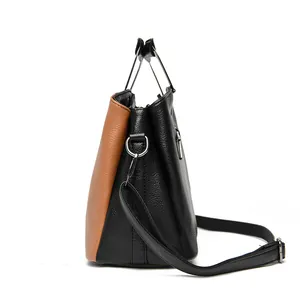 Fashionable contrast color leather handbag with large capacity and adjustable strap